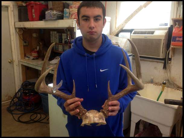 My son Matt is holding the rack of the buck he had at 30 yards but couldn't get a shot. He is not happy!
