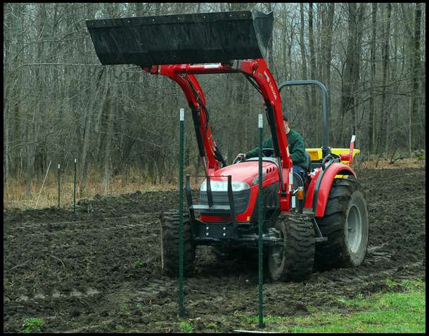 The loader on our McCormick X10.55 was a great way to drive in T-posts for the perimeter posts.